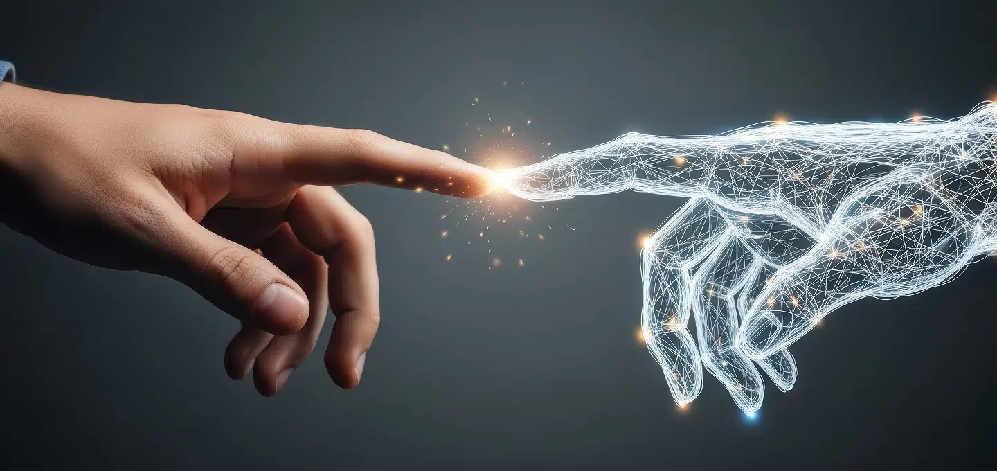 Article 50 of the AI Regulation: A human hand touches a digital AI hand – a metaphor for how companies should label AI content correctly