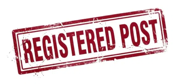 Red grunge rubber stamp reading "Registered Post" on a white background – symbolic image illustrating prima facie evidence for registered post in German employment law